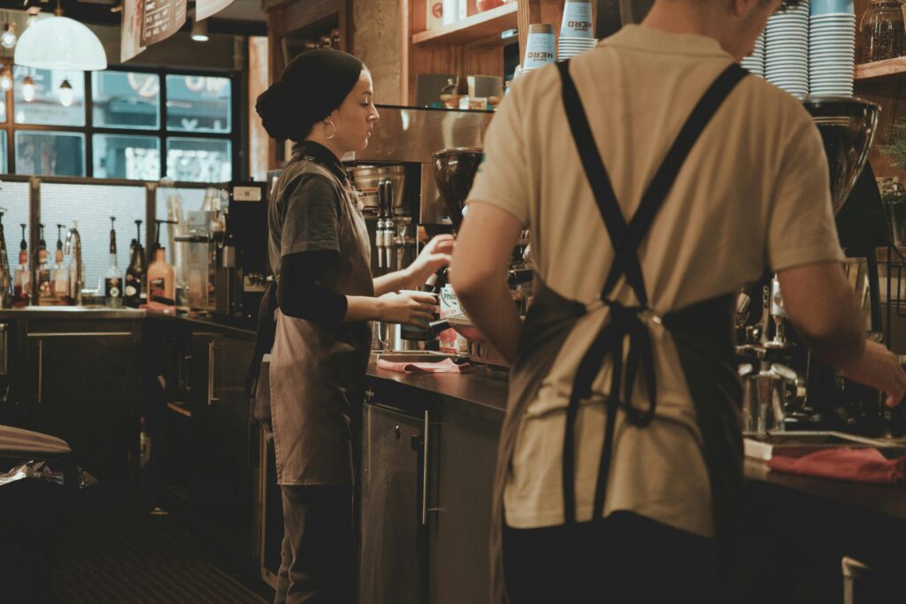 Baristas working behind the counter 