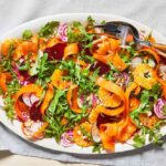 shaved-beet-and-carrot-salad-with-citrus-scallion-dressing-FT-RECIPE0422-00610b1862ae4aec920e662385fc6716
