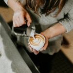 Barista preparing a customized coffee blend