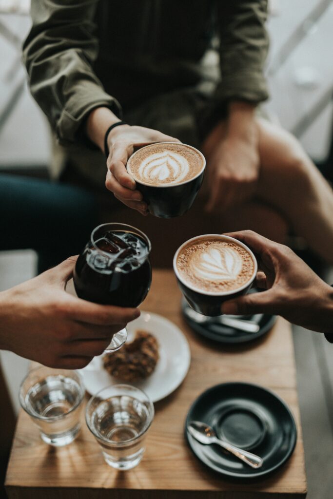 Friends enjoying coffee at PSB Cafe