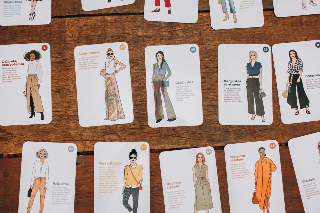 Multiple fashion illustrations display clothes combinations and style advice across wooden boards as part of this design.